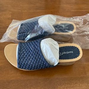 Never worn slip on sandals. Size 7.5